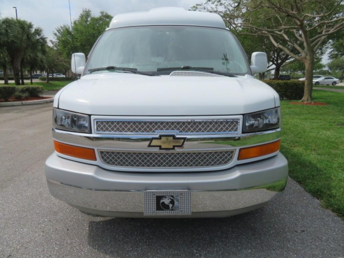 2010 White /Gray Chevrolet Express (1GNUGCD48A1) , located at 4301 Oak Circle #19, Boca Raton, FL, 33431, (954) 561-2499, 26.388861, -80.084038 - You are looking at a Gorgeous 2010 Chevy Express Handicap Wheelchair Conversion Van Explorer Limited SE with 31K Original Miles, Braun Century 750lb Side Entry Wheelchair lift, Tie Down System in the Floor, Rear Entertainment with Flat Screen TV/DVD, Leather Interior, Rear Power Folding Bench Seat/b - Photo#9